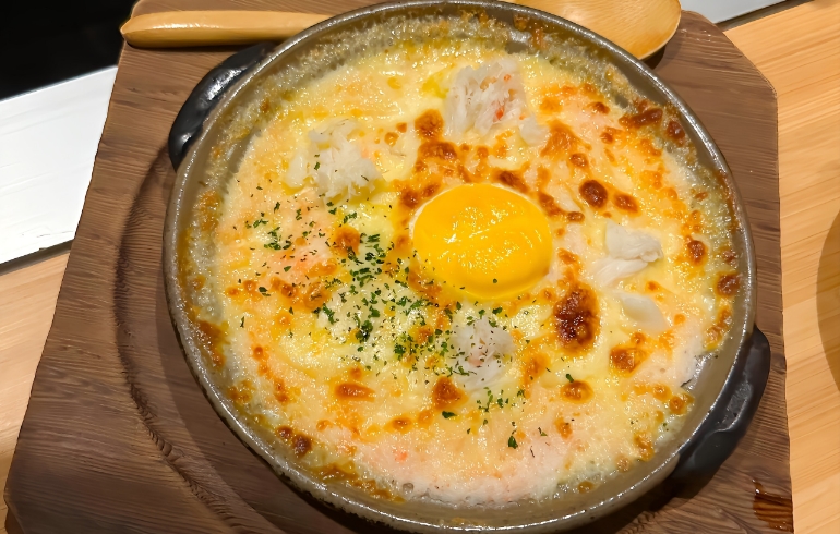 蟹と明太子ととろろのチーズ焼き